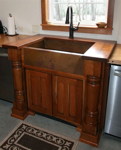 stainless steel or copper sink with cherry cabinets|white cherry cabinets.